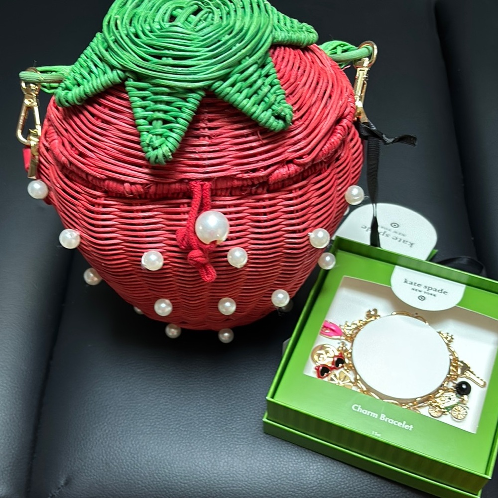 Kate Spade strawberry 🍓 purse and charm bracelet